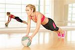 Woman using exercise ball