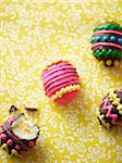 Decorated Easter eggs on floral background, studio shot