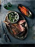 Overhead View of Roast Lamb with Carrots and Peas, Studio Shot