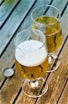 Beer glasses on a wooden table