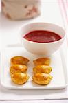 Yeast dumplings with a lentil and tomato filling and borscht