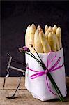 A bunch of white asparagus in a white cloth