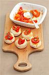 Puff pastry tartlets with cherry tomatoes