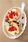 Apples stuffed with camembert and hazelnuts with cranberry jam