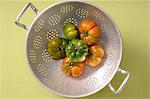 Beef tomatoes in a colander