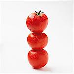 Three tomatoes, stacked