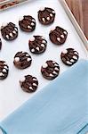 Decorated bear paws on a baking tray