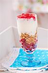 A layered dessert of redcurrants, porridge oats and yoghurt