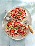 Small strawberry pizzas with basil