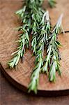 Fresh rosemary on a wooden board