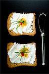 Melba toast with goat's cheese and bottarga