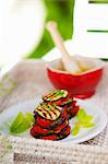 Vegetable stacks of grilled aubergine slices and tomatoes