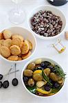 Olives, cheese crackers and salted almonds