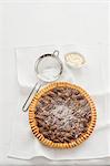 Pecan pie with icing sugar (view from above)