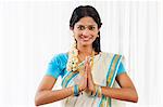 South Indian woman greeting and smiling