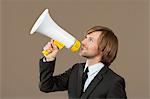 Businessman holding megaphone