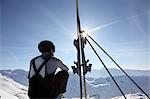 Skier on mountain top in Hochfuegen, Zillertal, Tyrol, Austria