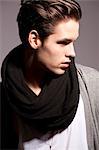 Young man wearing woolen scarf