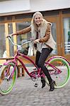Happy woman on bicycle