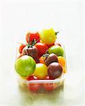 Punnet of multicolored tomatoes