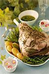 Shoulder of lamb cooked with herbs in a cloth