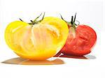 Half a yellow and red tomato