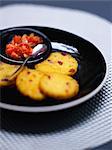 Golden polenta galettes,red pepper salsa