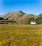 Caravan at Lake Moke Department of Conservation campsite, Queenstown, Otago, South Island, New Zealand, Pacific