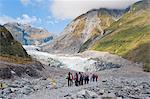 Tourists on Fox Glacier tour, Westland National Park, UNESCO World Heritage Site, South Island, New Zealand, Pacific