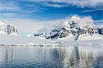 Snow-capped mountains surround Mickelson Harbor, Antarctica, Southern Ocean, Polar Regions