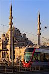 Tram with New Mosque in background, Istanbul, Turkey, Europe