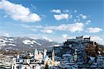 The Altstadt skyline including Salzburg Cathedral, Franziskaner Kirche and Fortress Hohensalzburg behind, Salzburg, Austria, Europe