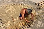 Weaving a basket tug boat, Phan Thiet, Vietnam, Indochina, Southeast Asia, Asia