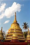 The gilded stupas of Wat In, Kengtung (Kyaingtong), Shan State, Myanmar (Burma), Asia