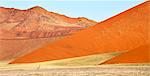 Overlapping orange sand dunes of the ancient Namib Desert near Sesriem, Namib Naukluft Park, Namibia, Africa