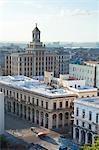 View over rooftops of Havana towards The Bacardi Building from the 9th floor restaurant of Hotel Seville, Havana Centro, Cuba