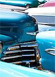 Vintage American cars parked on a street in Havana Centro, Havana, Cuba, West Indies, Central America