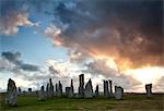 Standing Stones of Callanish at sunset with dramatic sky in the background, near Carloway, Isle of Lewis, Outer Hebrides, Scotland, United Kingdom, Europe