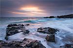 Winter sunrise at Porthgwidden Beach in St. Ives, Cornwall, England, United Kingdom, Europe