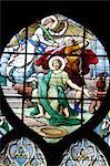 Depiction of the Martyrdom of St. John the Baptist in stained glass in Saint Severin church, Paris, France, Europe