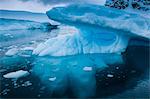 Huge glaciers shining blue, Danco Island, Antarctica, Polar Regions
