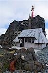 Little chapel and lighthouse at the Henryk Arctowski Polish Antarctic Station, King George Island, South Shetland Islands, Antarctica, Polar Regions