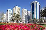 Contemporary architecture and Al Markaziyah Gardens and Fountain, Abu Dhabi, United Arab Emirates, Middle East