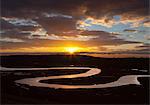 Cuckmere River meanders at sunset, near Seaford, South Downs National Park, East Sussex, England, United Kingdom, Europe