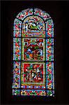A 12th century stained glass window in the nave of St.-Julien du Mans cathedral, Le Mans, Sarthe, Pays de la Loire, France, Europe