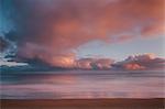 Dawn sky over Carbis Bay beach looking to Godrevy point, St. Ives, Cornwall, England, UK, Europe. Long exposure