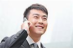 Smiling Businessman on the Phone in Beijing