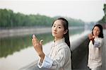 Two Chinese Women Practicing Tai Ji