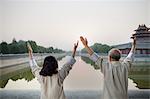 Two Chinese People Practicing Tai Ji