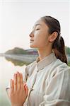 Young Woman Practicing Tai Ji